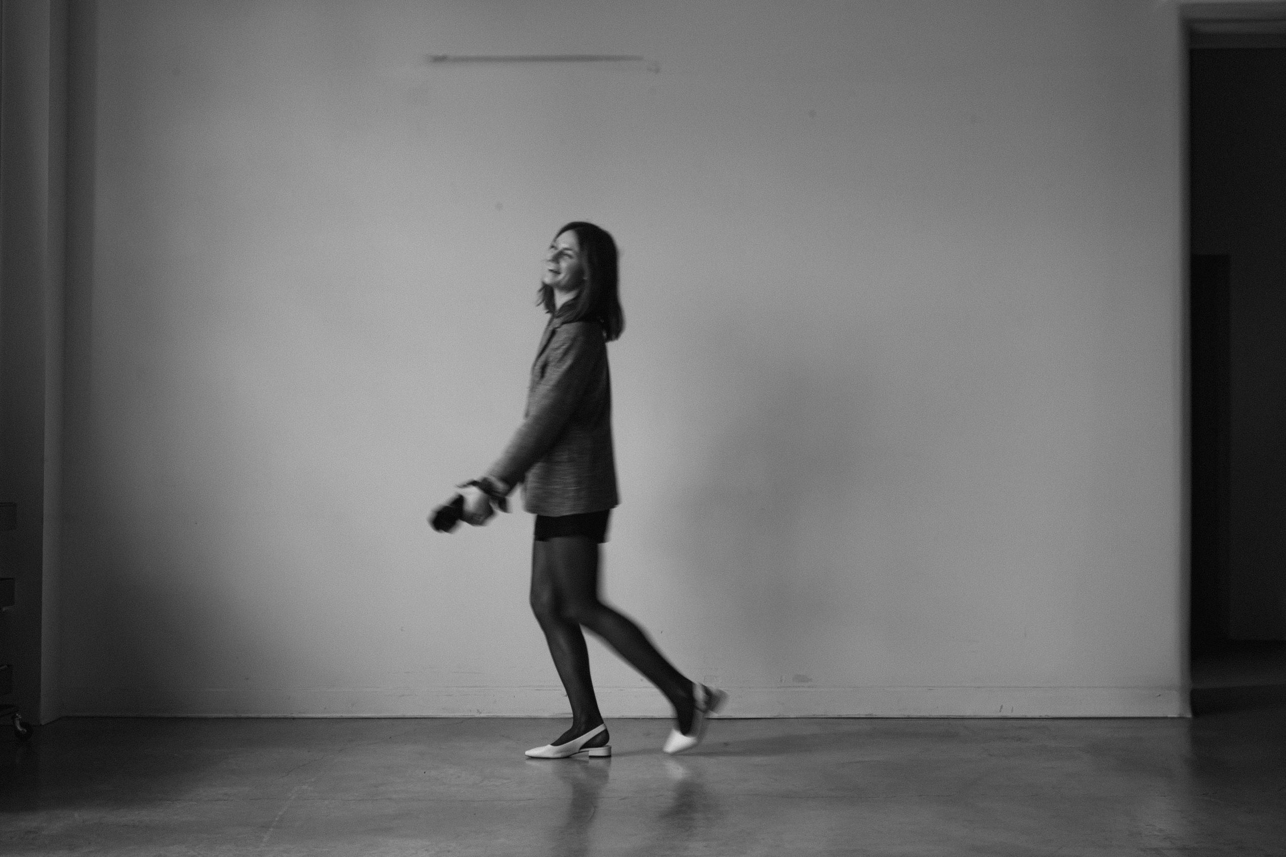 Wedding photographer working calmly alongside a planner during a North Carolina wedding day.